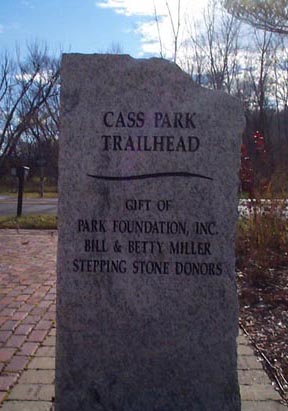 Image of granite trailhead marker at Cass Park in Ithaca, NY